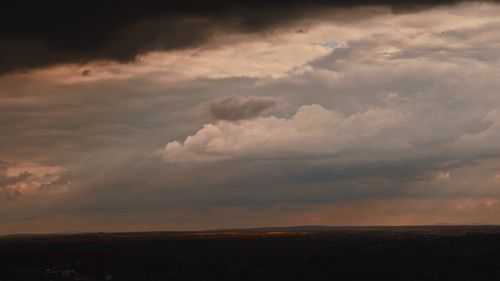 Mountain landscape with dramatic sunset sky after